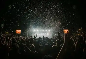 people gathering on concert field