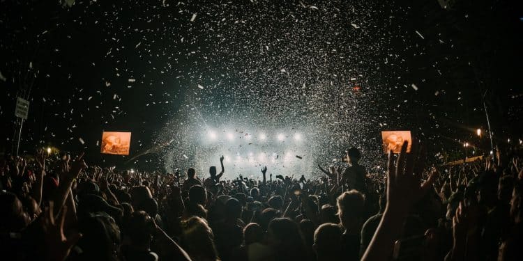 people gathering on concert field